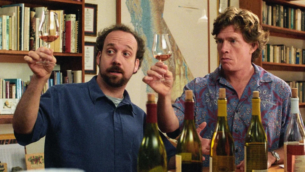 scene from the movie Sideways with two actors holding wine glasses